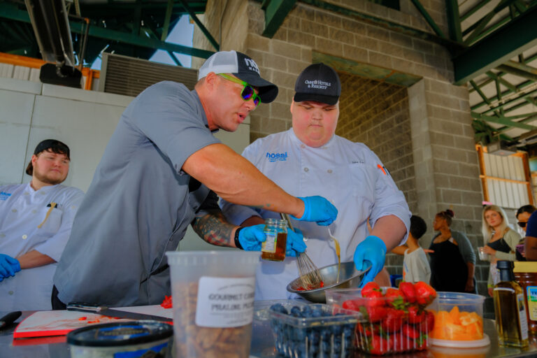 Chef Zac and students preparing for an off-campus catering event.