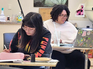 Julissa and Zee creating their book