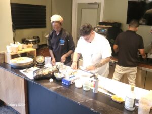 68c196a5ef0ed7e2cb6dd3d9 Tuna Cutting Ceremony at Schermerhorn Symphony Center — Students worked alongside Master Chef Alfredo Bueno and culinary connector Rey Bello